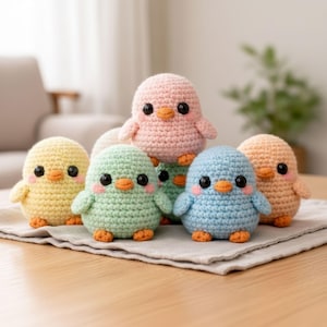 May include: A set of three ceramic mugs with a speckled, matte finish in cream, light grey, and dark grey. Each mug has a simple, minimalist design, suitable for coffee or tea.