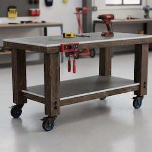 May include: A brown wooden workbench with a dark gray top and a lower shelf. The workbench has four wheels with blue accents. A red drill, measuring tape, and tools are on the top. A red clamp with tools is attached to the side.
