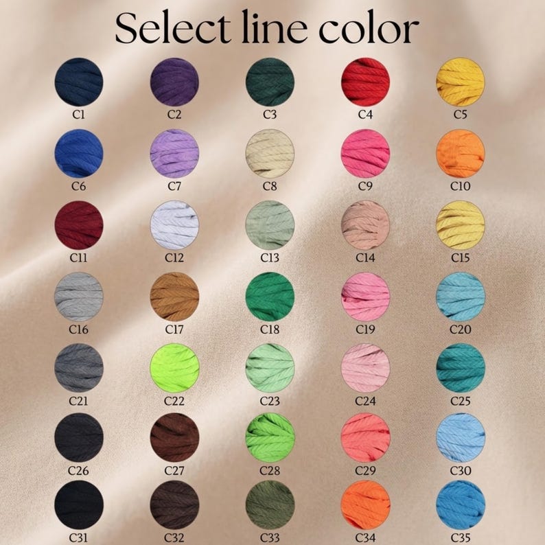 K&ouml;nnte beinhalten: Eine Farbkarte mit 35 Garnfarboptionen, jeweils in einem kleinen Kreis. Die Farben reichen von Dunkelblau bis Hellblau, mit Schattierungen von Lila, Gr&uuml;n, Rot, Gelb, Rosa, Orange und Braun. Der Text oben lautet "Select line color".