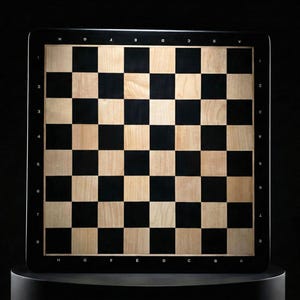 May include: A square wooden chessboard with a black border and a checkerboard pattern of alternating black and light wood squares. The board is set against a dark background, highlighting the contrast of the colors. The board is designed for a game of chess.