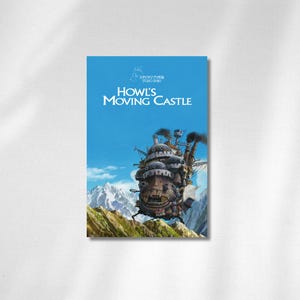 May include: A poster featuring the animated film "Howl's Moving Castle." The poster has a blue background with the film's title in white and the image of the castle. The castle is a steampunk-inspired structure with a face, set against a mountain backdrop.