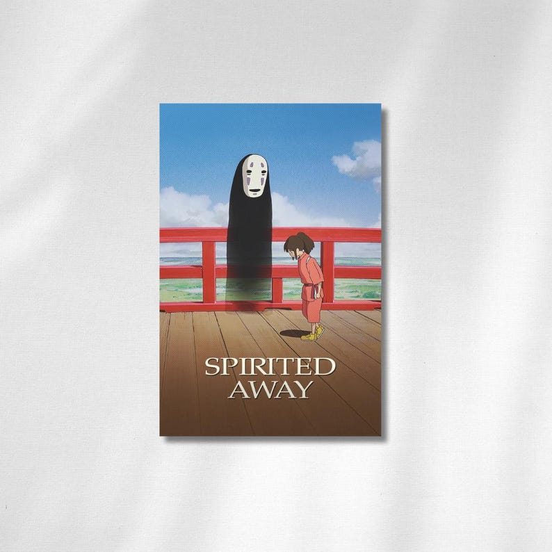 May include: A poster featuring a scene from the animated film "Spirited Away." The image shows a tall, dark figure with a white mask and a young girl in a red outfit on a wooden deck. The title "Spirited Away" is displayed at the bottom.