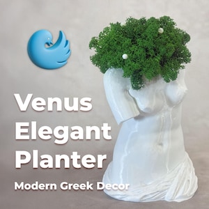 May include: A white Venus-shaped planter filled with green moss and small white accents. The planter has a sculpted torso design and the text "Venus Elegant Planter" and "Modern Greek Decor". A blue logo is in the upper left corner.