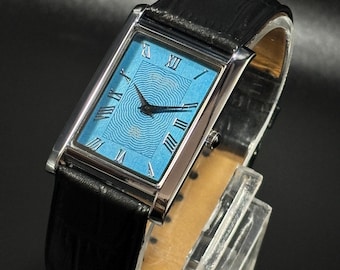 Reloj Seiko Tank vintage: Reloj de vestir con correa de cuero fabricado en Japón.