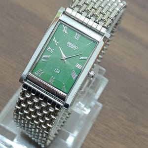 Vintage Seiko Slim Tank herrarmbandsur tillverkat i Japan, rostfritt stål/rektangulär form