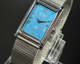 Vintage Seiko slanke herentank Japan gemaakt polshorloge roestvrij staal/Romeinse wijzerplaat