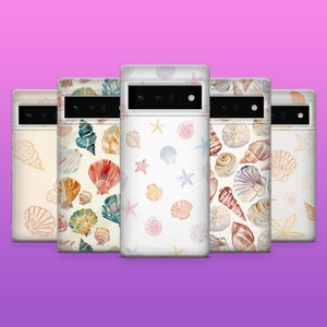 May include: Five phone cases with seashell designs. The cases feature various watercolor patterns of seashells, starfish, and sand dollars in shades of beige, blue, orange, and pink. The cases are white with black camera lenses.
