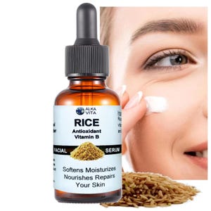 May include: An amber glass dropper bottle of Alka Vita Rice Antioxidant Vitamin B facial serum. The white label features the text Rice Antioxidant Vitamin B, Softens Moisturizes Nourishes Repairs Your Skin, and an image of a pile of brown rice.