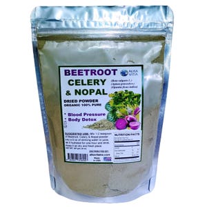 May include: A silver, resealable pouch containing dried powder labeled "BEETROOT CELERY & NOPAL." The label includes the words "DRIED POWDER ORGANIC 100% PURE" and the phrases "Blood Pressure" and "Body Detox." The net weight is 227 grams.