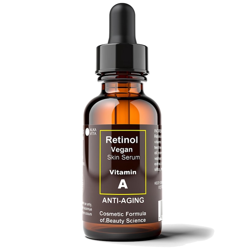 K&ouml;nnte beinhalten: Eine bernsteinfarbene Glasflasche mit Pipette, die Retinol Vegan Skin Serum mit Vitamin A enth&auml;lt. Das Etikett zeigt wei&szlig;en Text auf dunklem Hintergrund, einschlie&szlig;lich Anti-Aging und Cosmetic Formula of Beauty Science, mit schwarzer Pipettenkappe.