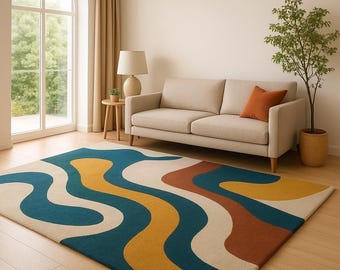 May include: A rectangular area rug with a retro design. The rug features a wavy pattern in teal, mustard yellow, cream, and rust colors. The rug is placed on a light wood floor in a living room setting.