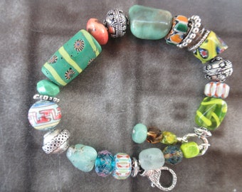 BOHO CHIC BRACELET African Trade beads old tribal beads Bali silver large green chrysoprase focal Harriet Love Jewelry