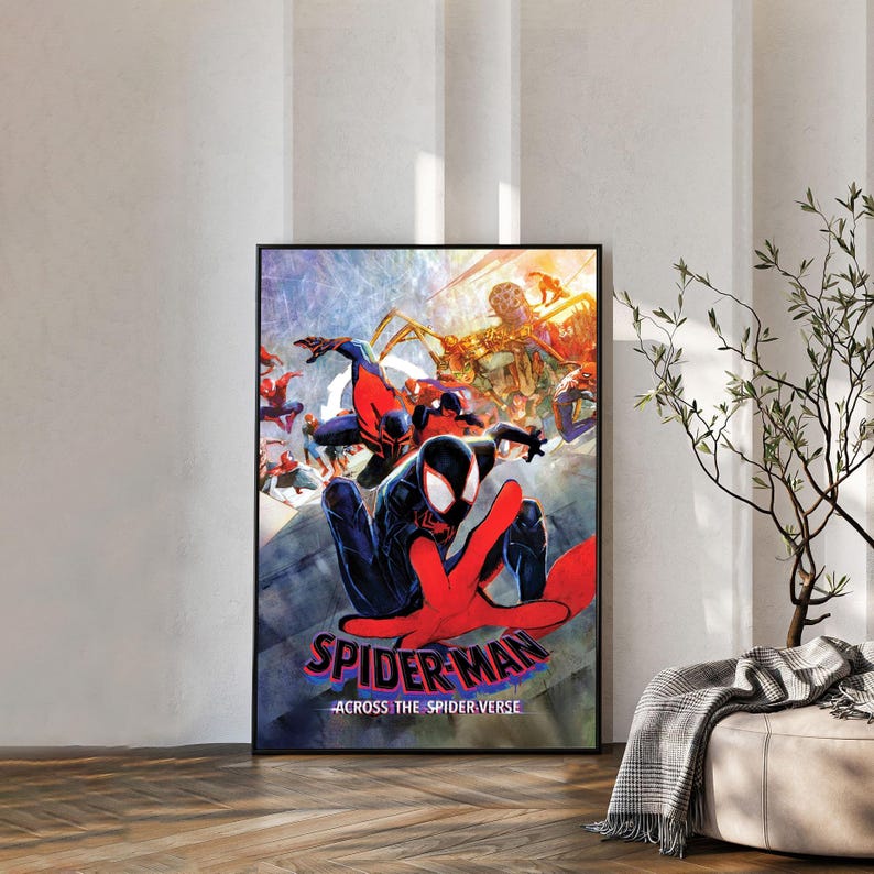 May include: A rectangular wall poster featuring a dynamic illustration of Spider-Man characters in action. The artwork displays vibrant red, blue, and yellow colors with the bold text "SPIDER-MAN ACROSS THE SPIDER-VERSE" printed at the bottom.