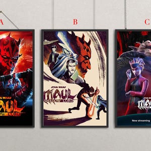 May include: Three framed Star Wars posters featuring Darth Maul and other characters. The posters have a dark color scheme with red, blue, and black hues. The text "STAR WARS MAUL SHADOW LORD" is visible on each poster.