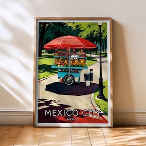 May include: A framed print depicting a fruit cart in Mexico City. The illustration shows a blue cart with a red umbrella, laden with fruit. The artwork is in a vintage travel poster style, with the text "MEXICO CITY" at the bottom.