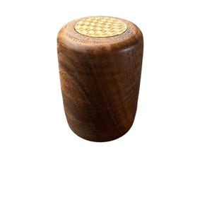 May include: A set of three ceramic mugs with a speckled, matte finish. The mugs are in shades of cream, light gray, and dark gray. Each mug has a simple, minimalist design, perfect for coffee or tea.