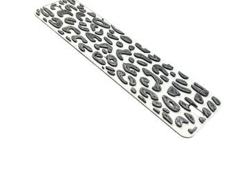 Eliminar la matrícula con estampado de leopardo