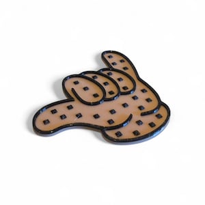 Almohadilla para snowboard con símbolo de Shaka