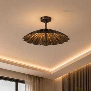 May include: A bronze-colored ceiling light fixture with a scalloped shade. The fixture is suspended from the ceiling and has a central stem. The text "ACE LIGHTING" is visible in the upper right corner. The light is illuminating the ceiling.