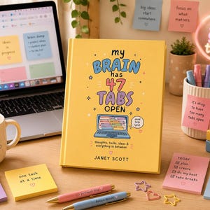 May include: A yellow hardcover book titled My Brain Has 47 Tabs Open by Janey Scott, featuring a graphic of a laptop with open tabs. The cover includes the text send help pls and thoughts, tasks, ideas & everything in between, surrounded by small star icons.