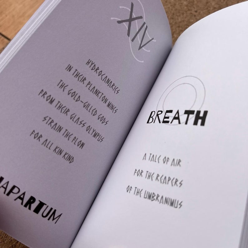 May include: An open book with white pages featuring black text in a stylized font. The left page displays the Roman numeral XIV and a poem starting with Hydrocanaries. The right page features the word BREATH and a subtitle about air and reapers.