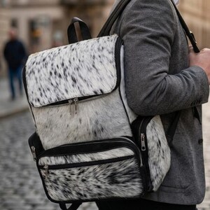 white and black cowhide leather backpack