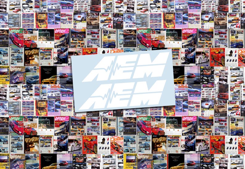 May include: A collage of car magazine covers forms the background for a light blue rectangle with the white text "NEM NEM". The text has a stylized waveform design incorporated into the letters, suggesting a connection to automotive performance or technology.