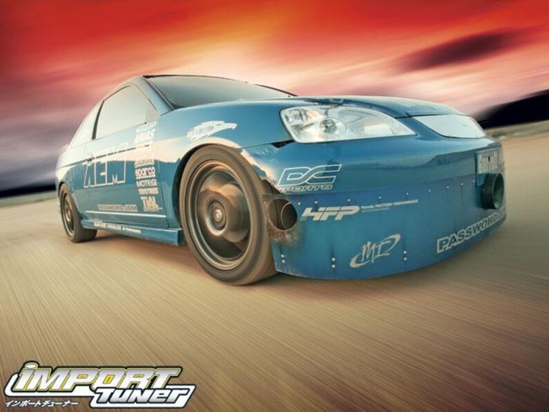 May include: A blue sports car with racing decals and a blurred background. The car has black wheels and is moving fast. The image has the text "IMPORT TUNER" at the bottom.
