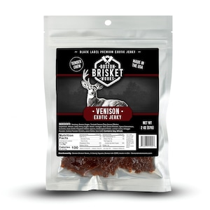 May include: A clear plastic bag of Boston Brisket Works Venison Exotic Jerky. The label features a deer illustration and the text "Venison Exotic Jerky." The bag contains 2 oz (57g) of jerky and has a "Tender Chew" label.