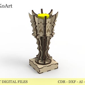 May include: A laser-cut wooden candle holder with a detailed, ornate design. The holder features a square base, a tall, decorative body with flame cutouts, and a yellow candle. The text "EstetiKoArt" is visible.
