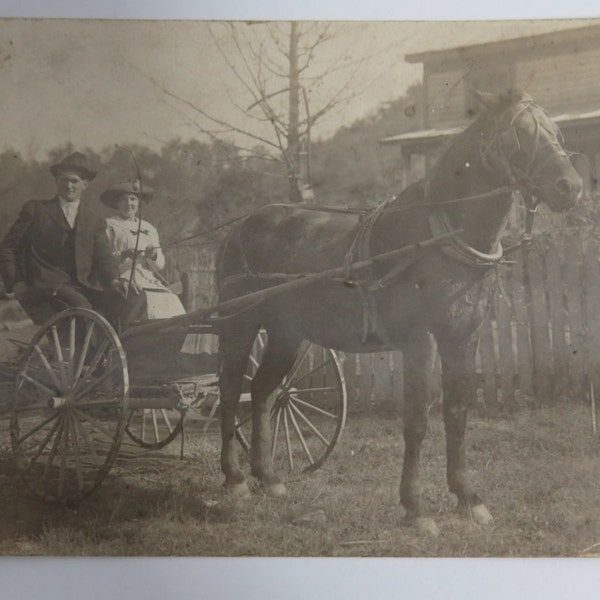 Real Photo Postcard of a Couple on a Horse and Buggy