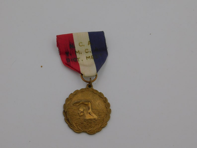 Vintage NCA YMCA Dist Meet Gold Swimming Medal Pin Ribbon dr69