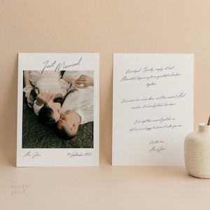 May include: Two white rectangular cards. The left card has a photo of a couple lying on grass with the words "Just Married" and the names "Ana - John" and the date "05 September 2050". The right card has handwritten text.