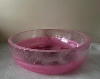 Large decorative pink bowl with flowers made from resin