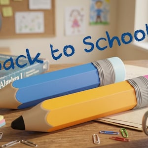 May include: Two large pencil-shaped containers, one blue and one yellow, featuring black tips and grey textured erasers. The text "Back to School" is written in blue script above the pencils, which are arranged on a wooden surface with paper clips.