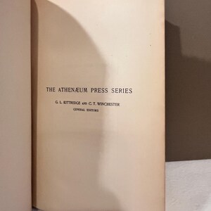 May include: Open book page with text: "THE ATHEN&AElig;UM PRESS SERIES" and the names "G. L. Kittredge and C. T. Winchester, General Editors." The page is off-white with a slight yellow hue, and the text is in a dark, classic font.