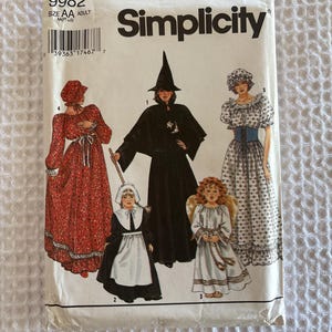 May include: A Simplicity sewing pattern featuring costume designs. The pattern includes illustrations of a witch, angel, and other historical and fantasy outfits. The package is white with black text and a barcode.