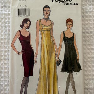 May include: A Vogue Patterns sewing pattern envelope, number 9595, for sizes 8-10-12. The front displays illustrations of three sleeveless dresses: a knee-length burgundy dress, a floor-length gold gown, and a black knee-length dress with a bow.