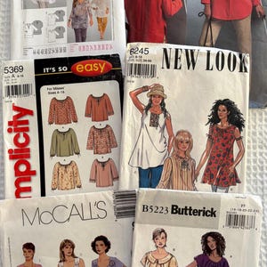 May include: A collection of sewing patterns for women's tops and tunics. The patterns feature various styles, including tunics, blouses, and dresses. The patterns are from brands like Burda Style, Simplicity, McCall's, New Look, and Butterick.