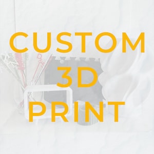 May include: Image with the words "CUSTOM 3D PRINT" in large, yellow capital letters. The background is a soft white. Various 3D printed objects are visible, including a white square frame and a small, gray cupcake liner.