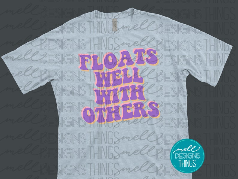 May include: A light blue t-shirt with a purple and orange graphic that says "Floats Well With Others".