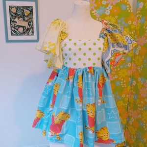 daniel tiger birthday dress Made my daughter a Daniel Tiger dress for her 3rd birthday party. Very pleased with it! : r/sewing