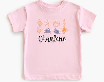 Personalisierte Mädchen Muschel Shirt, benutzerdefinierte Name Strand Thema T-Shirt, niedlichen Sommer Ocean Shell Shirt für Kinder Geburtstag, Kleinkind Baby T-Shirts