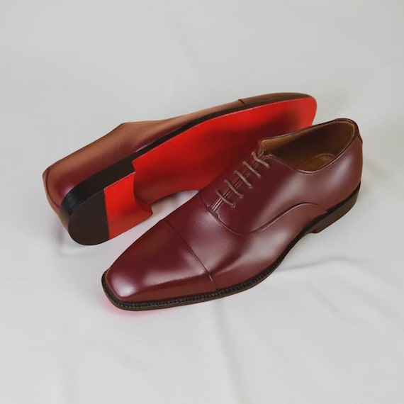 christian louboutin greggo men's lace-up leather dress shoes Buy Oxfords Calf Men Handcrafted Leather Oxford Shoes With Red Sole | Stylish Lace up Formal Online in India they convey quiet yet