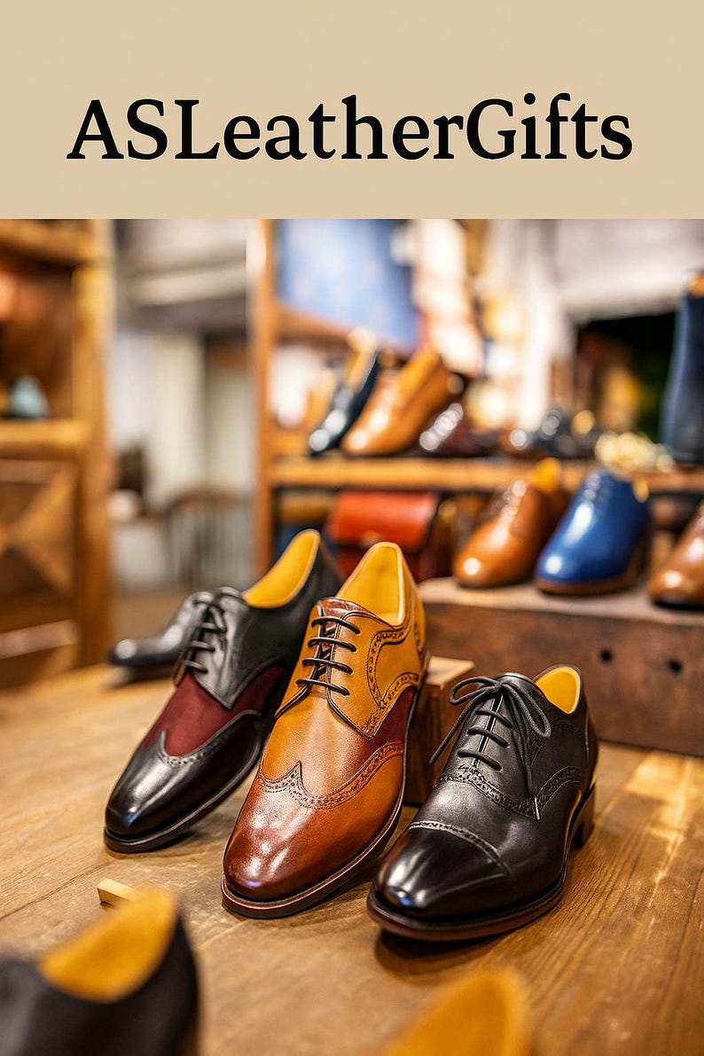 Puede incluir: Texto ASLeatherGifts sobre tres zapatos oxford de cuero. Un zapato es negro y burdeos, otro es color canela con detalles brogue y otro es negro s&oacute;lido. Cada zapato presenta cordones negros, punta redondeada y un forro interior amarillo.
