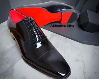 Christian Louboutin Greggo Oxfords para hombre de piel de becerro negra con suela roja