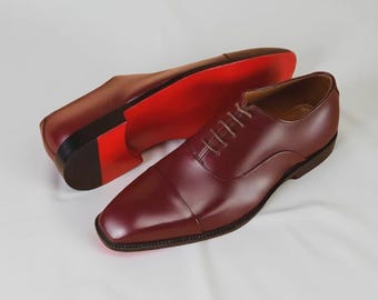 Christian Louboutin Greggo Oxfords de piel de becerro Zapatos de hombre