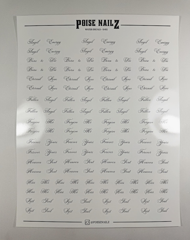 May include: A white sheet of water decals by POISE NAILZ featuring rows of black cursive text including phrases like Angel Energy, Born to Die, Eternal Love, Fallen Angel, Forgive Me, Forever Yours, Heaven Sent, Kiss Me, and Lost Soul.