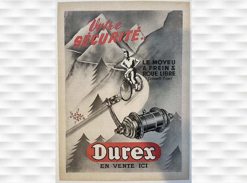 May include: Vintage advertisement for Durex bicycle parts. The image features a cyclist on a mountain slope, with text in French. The ad highlights the hub with a brake and free wheel. The Durex logo is prominently displayed.