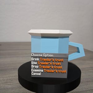 May include: A 3D-printed mug with a light blue body, white rim, and blue handle. The mug sits on a black circular base. A gray panel displays the text "Choose Option" and several action options in orange text.